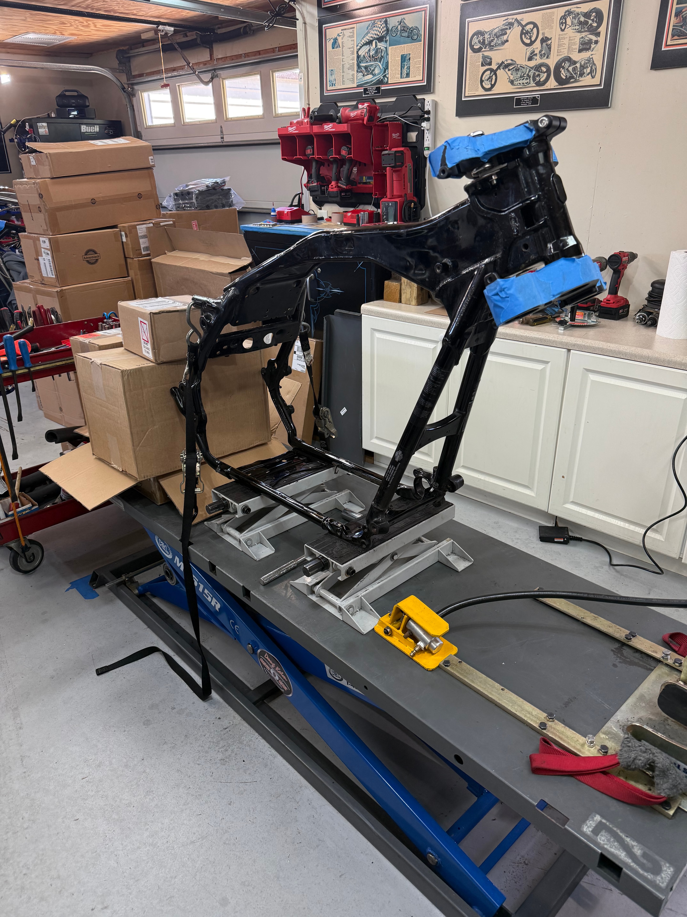 Down to bare steel — fully disassembled, the frame stripped clean and ready for the transformation to begin.