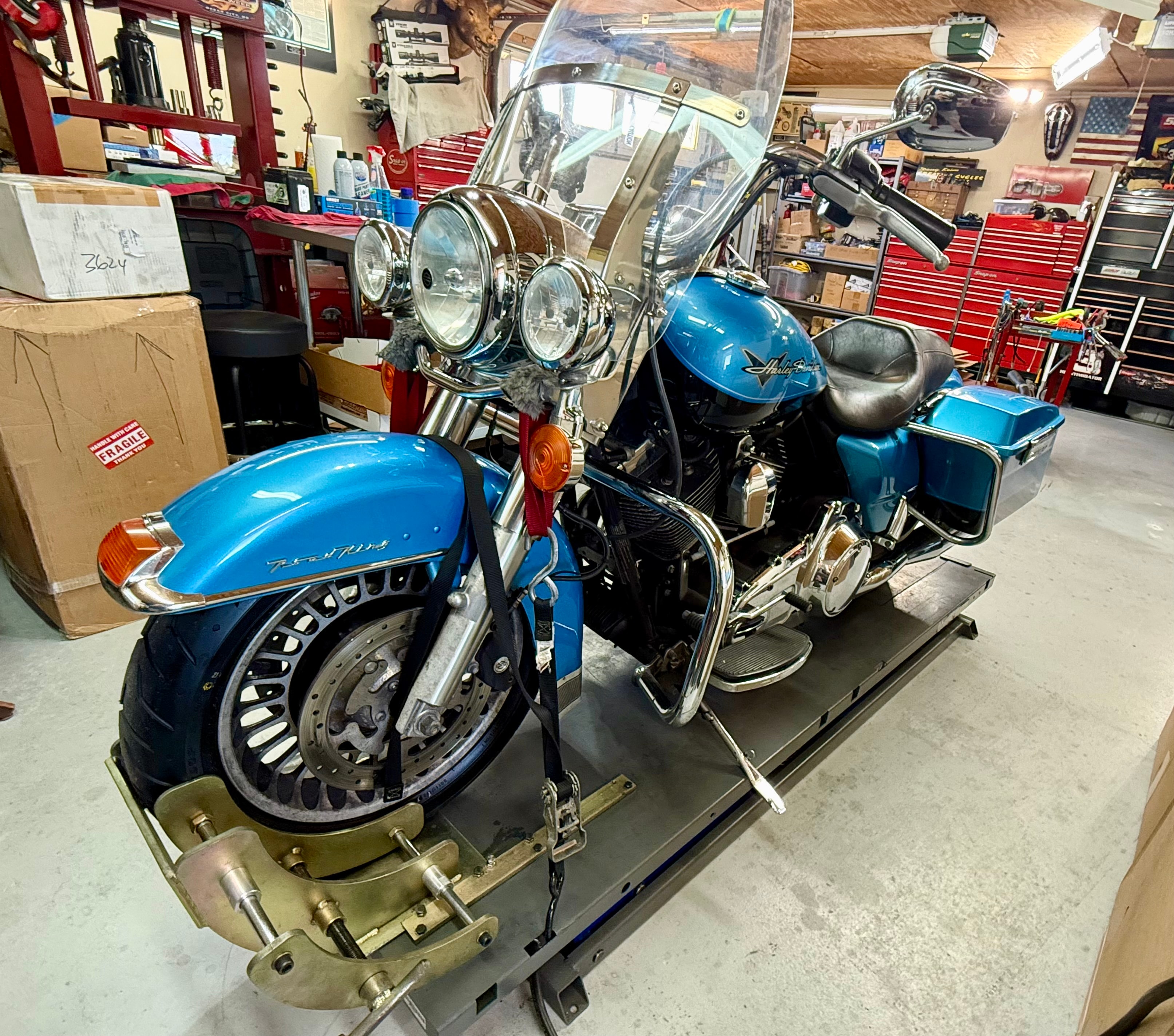 Where it all begins — the donor bike, a Harley-Davidson Road King, as she arrived at the Creative Cycles shop in Umatilla, Florida.